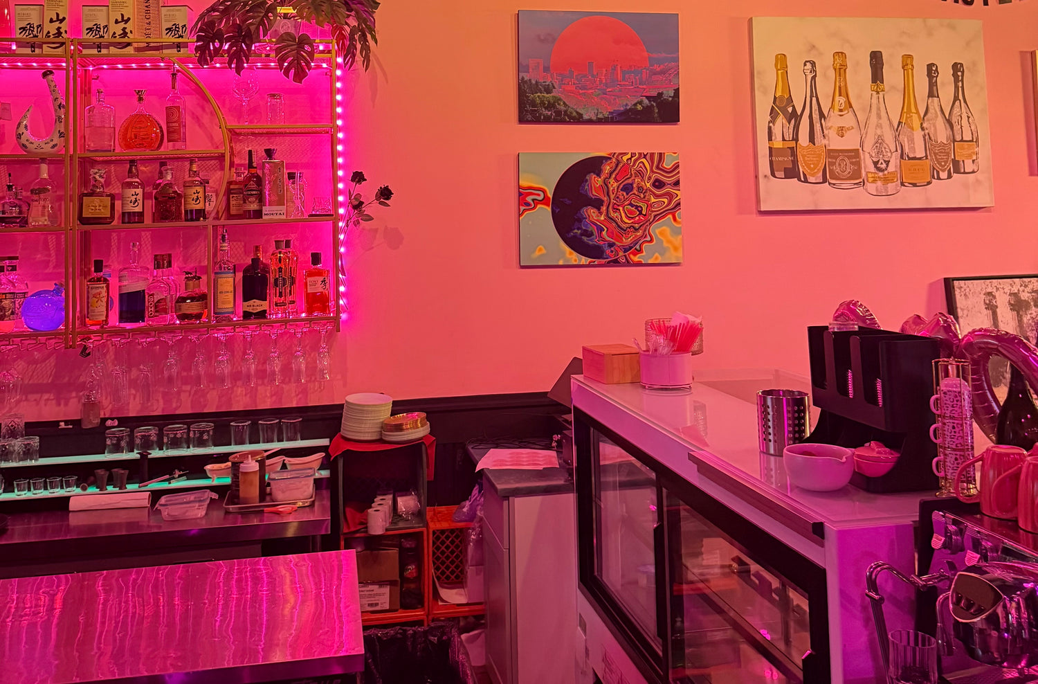 Offbeat wood panel art installation at Champagne Poetry in Portland featuring colorful modern wall art from Capsule 01