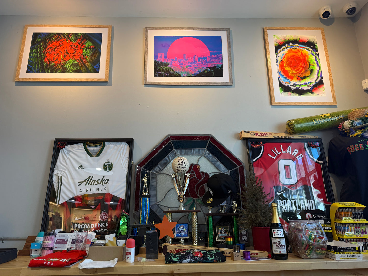 Offbeat art installation at Rose Budz in Portland featuring Rose Fence, Portland Love, and Rainbow Rose artworks