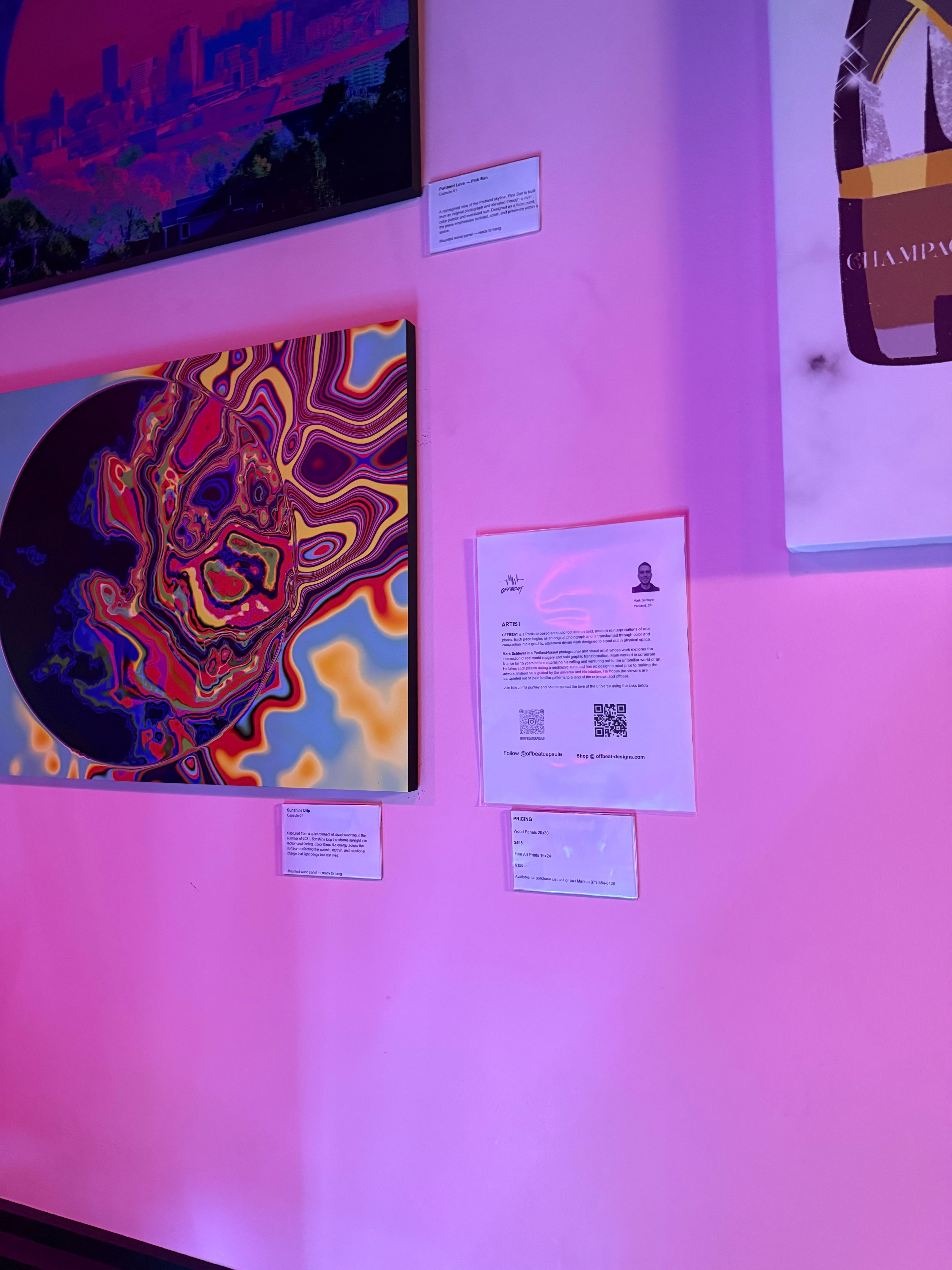 Close-up of Sunshine Drip wood panel artwork by Offbeat in Portland restaurant setting